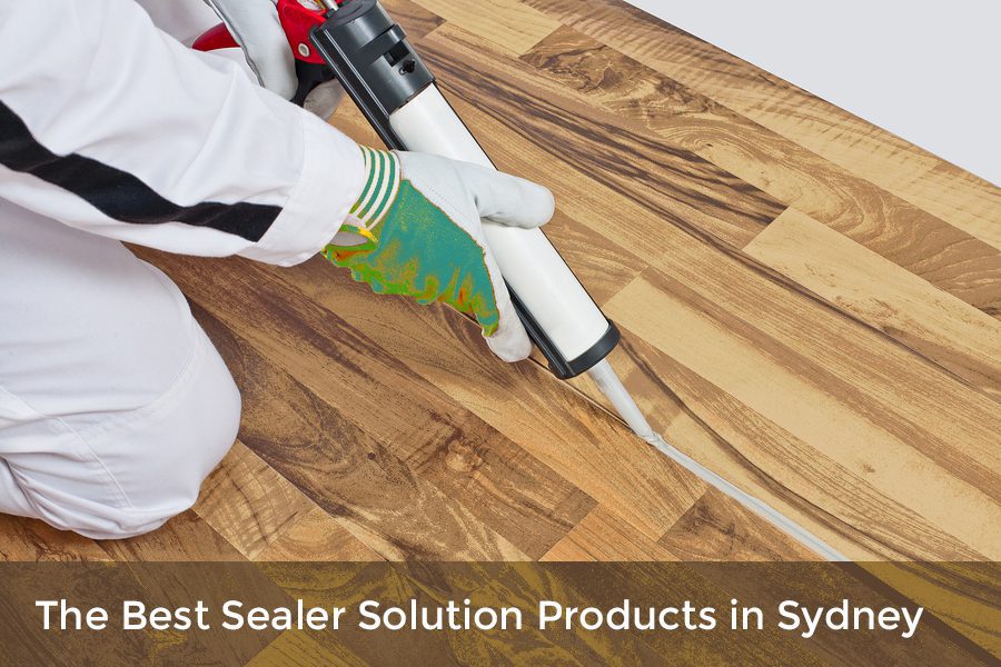 The man is using sealer solution for flooring